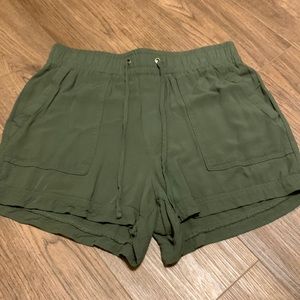 green linen shorts